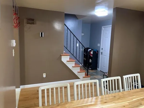 a view of entryway with stairs