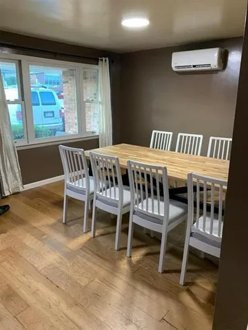 a bathroom with a sink a toilet and bathtub