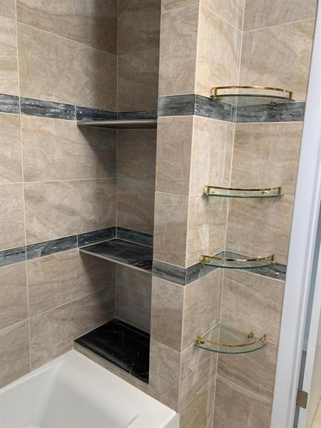 206 Bonnie Street Rostraver Township, PA 15012 - Photo 9 of 26 a bathroom with a shower