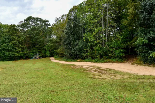 a view of a street with cars
