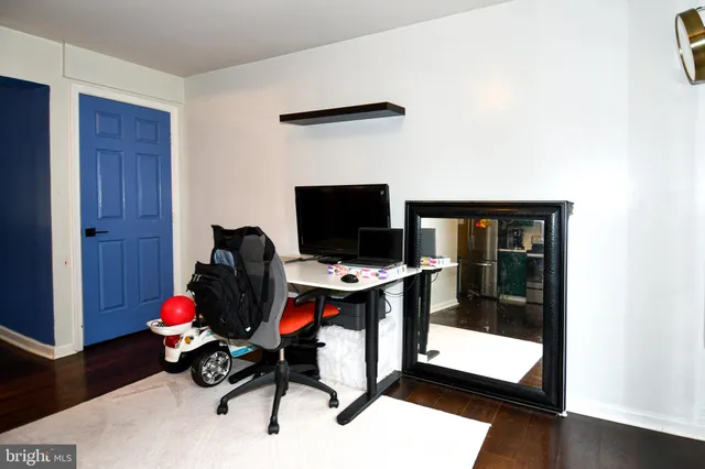 a room with toys and wooden floor