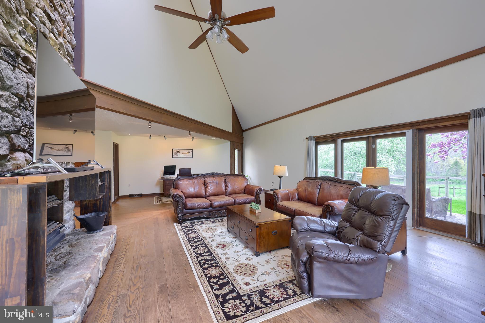 15 Dead End Road Lititz, PA 17543 - Photo 12 of 49 a living room with furniture fireplace and a large window