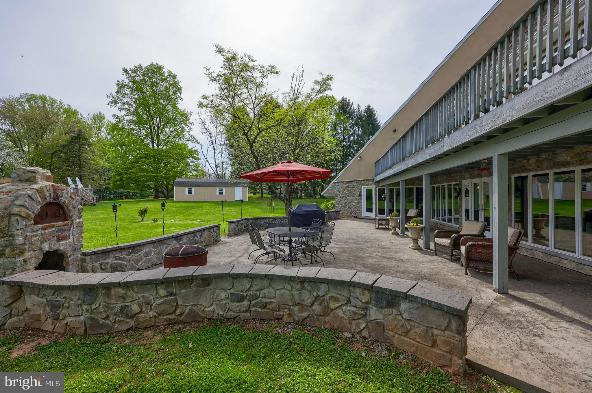 15 Dead End Road Lititz, PA 17543 - Photo 15 of 49 a view of a backyard with a patio and outdoor seating