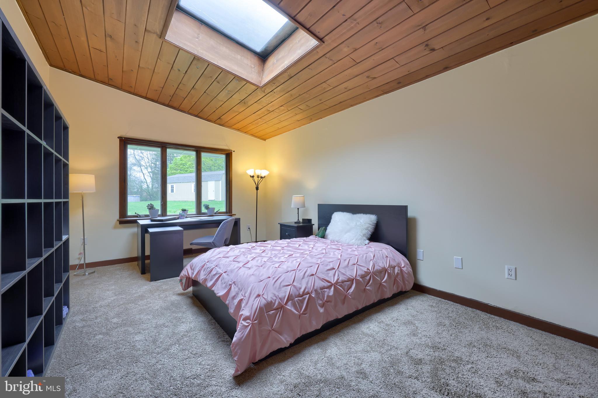 15 Dead End Road Lititz, PA 17543 - Photo 34 of 49 a bedroom with a bed and a dresser next to a window