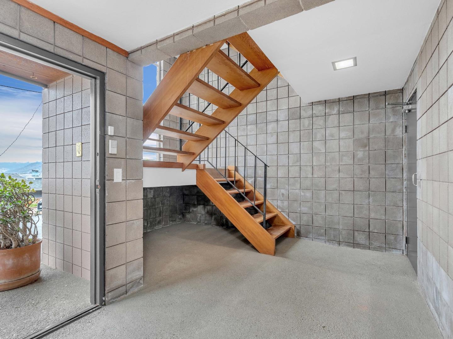 224 Olympian Way Pacifica, CA 94044 - Photo 19 of 46 a view of staircase with white walls and stairs