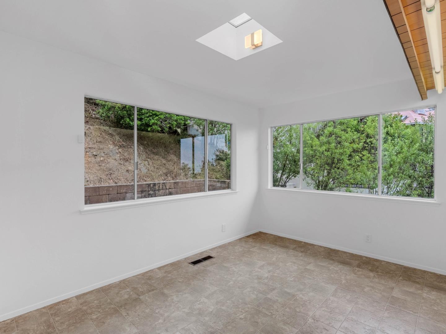 224 Olympian Way Pacifica, CA 94044 - Photo 30 of 46 an empty room with a window