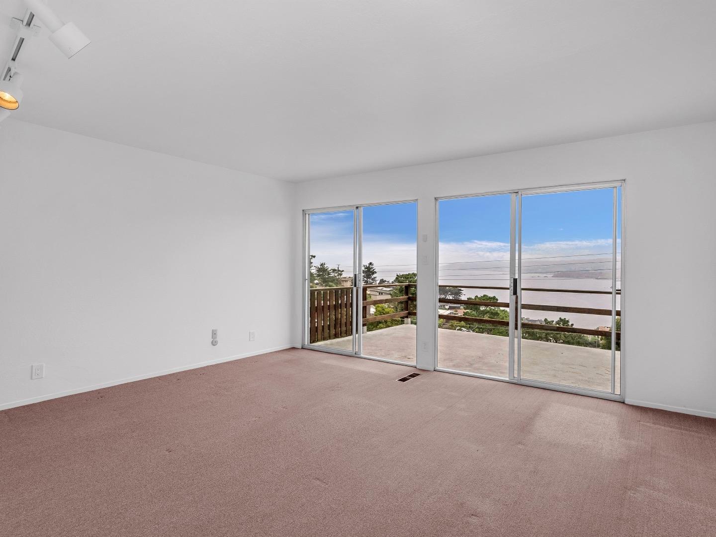 224 Olympian Way Pacifica, CA 94044 - Photo 33 of 46 a view of an empty room with a window