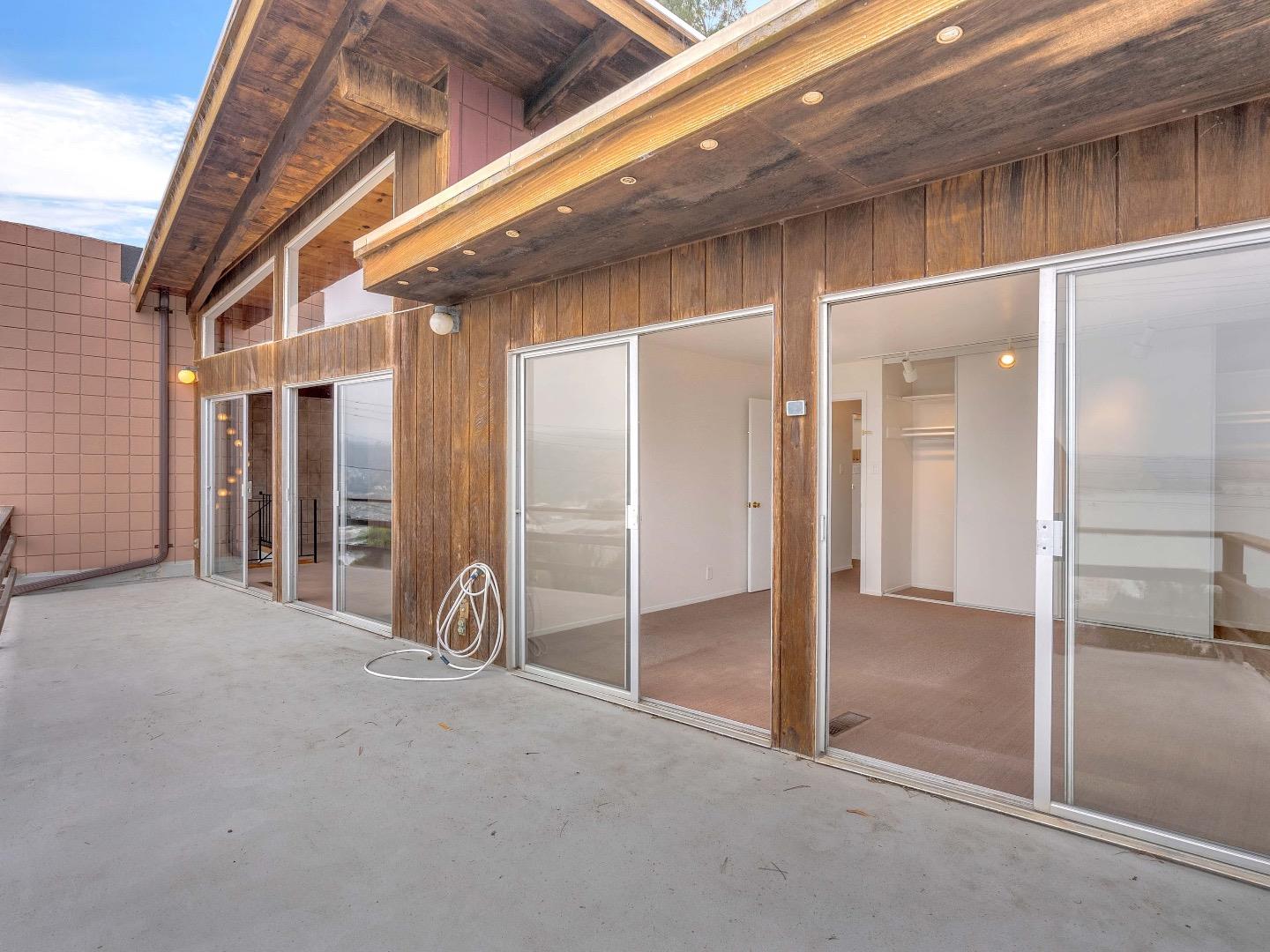 224 Olympian Way Pacifica, CA 94044 - Photo 37 of 46 a view of a hallway with staircase