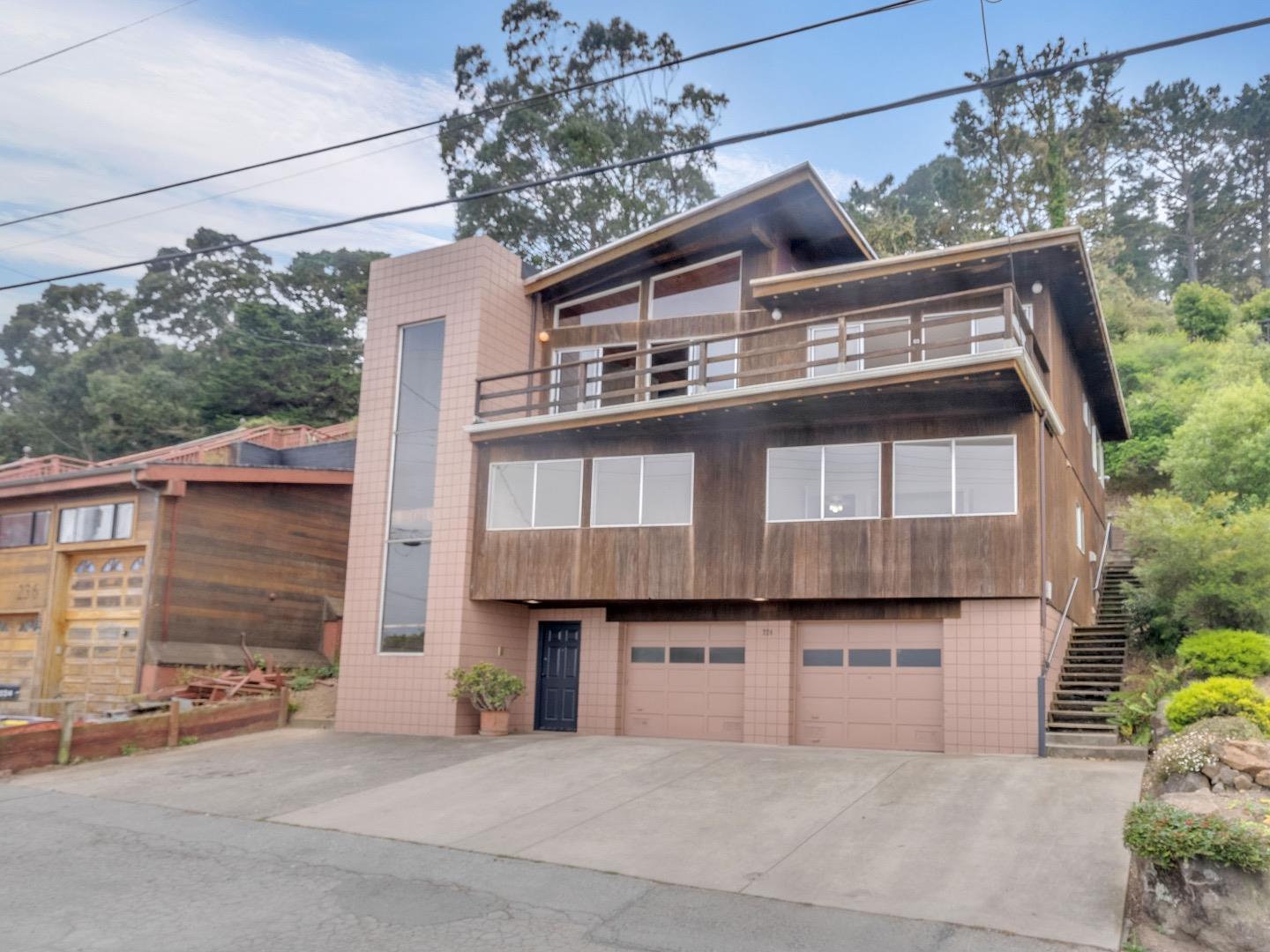 224 Olympian Way Pacifica, CA 94044 - Photo 4 of 46 a view of a large building