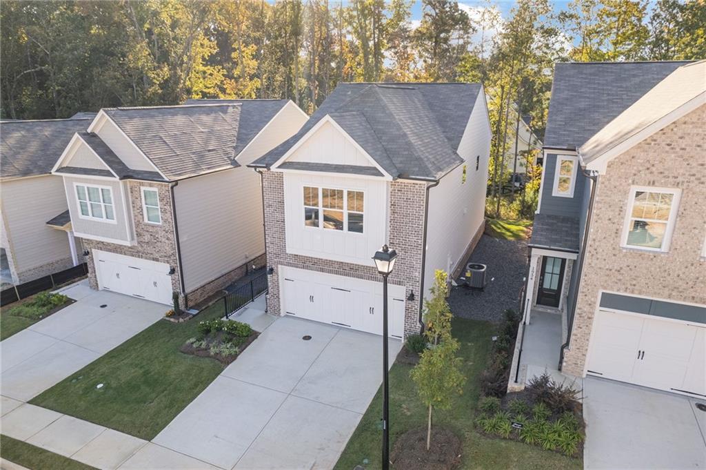 2717 Rylee Carter Street Dacula, GA 30019 - Photo 29 of 29 a view of house with a yard