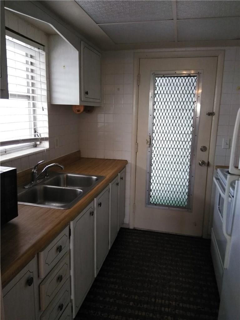 1250 East Sample Road, Unit 311 Pompano Beach, FL 33064 - Photo 6 of 13 KITCHEN