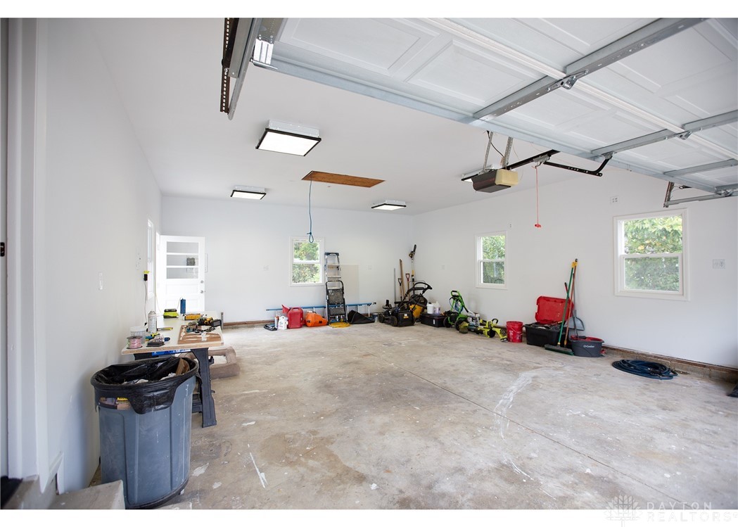 163 Grange Hall Road Beavercreek, OH 45430 - Photo 6 of 39 Extra tall 2-car garage with overhead storage!