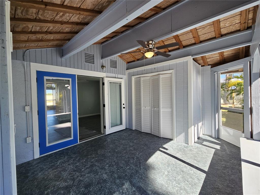8229 Cypress Road Englewood, FL 34224 - Photo 22 of 44 a view of an entryway with wooden floor