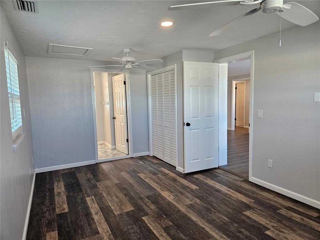 8229 Cypress Road Englewood, FL 34224 - Photo 34 of 44 a view of hallway with wooden floor