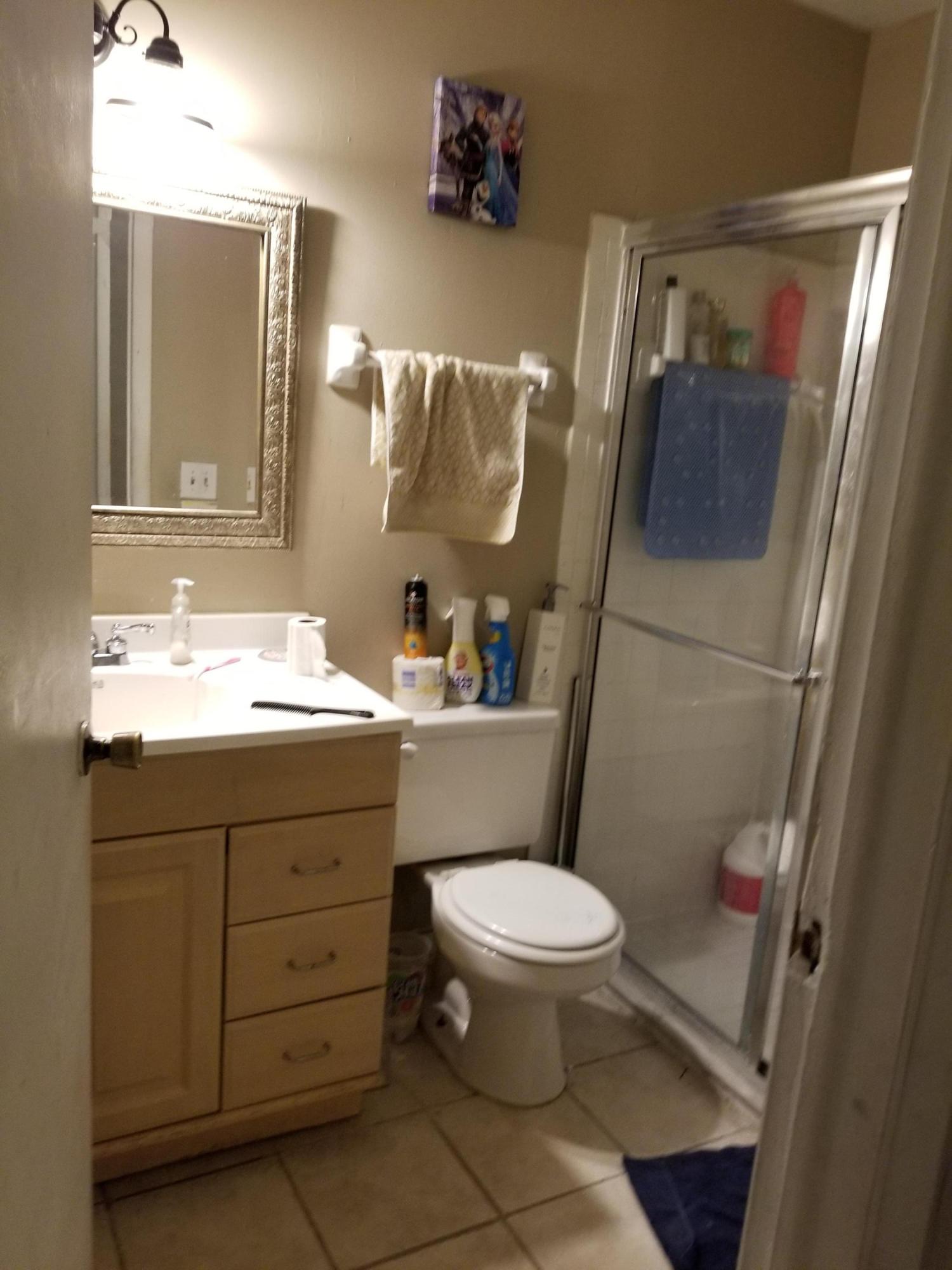 377 Southwest Cherryhill Road Port St. Lucie, FL 34953 - Photo 11 of 13 Guest Bathroom