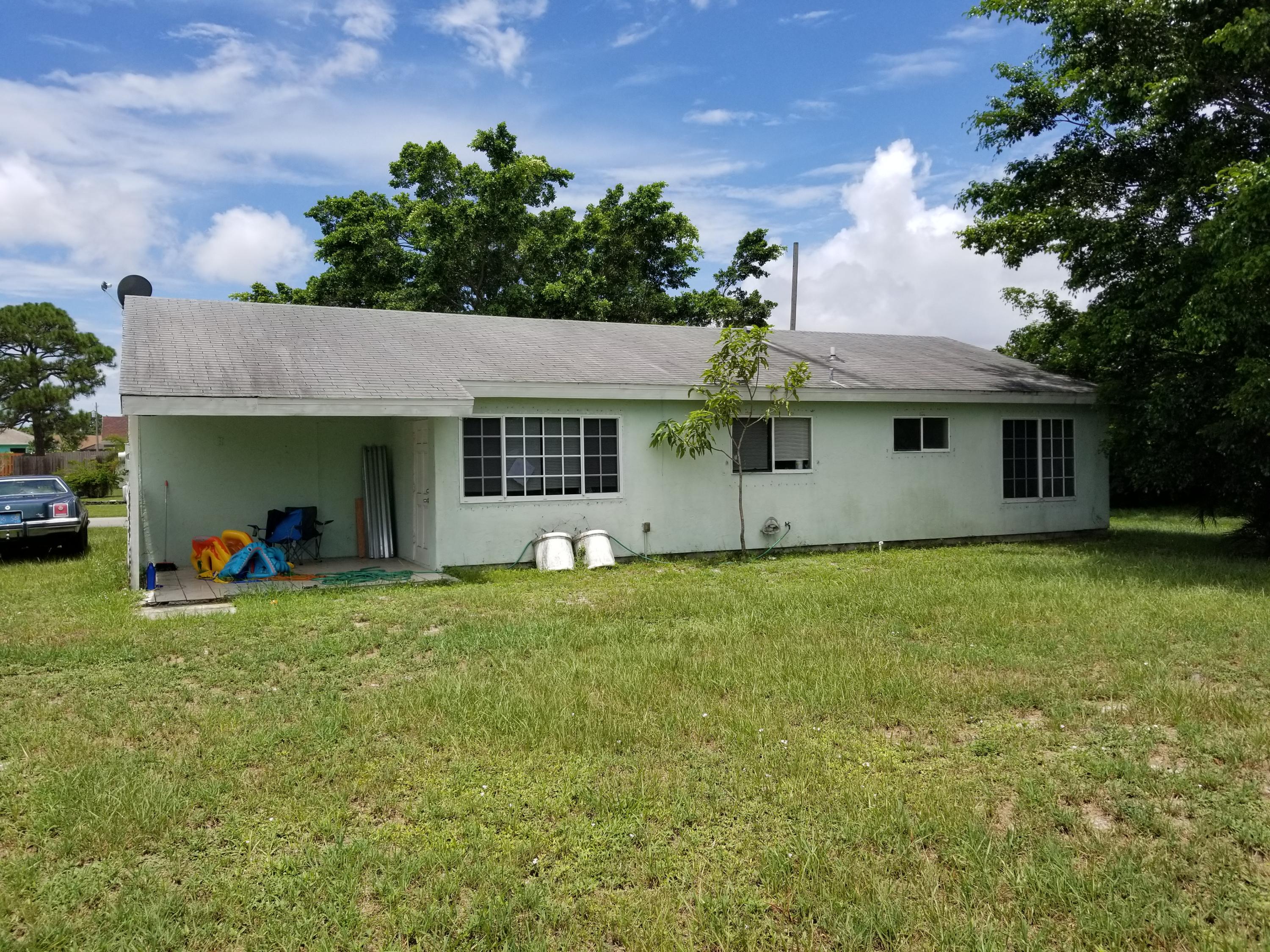 377 Southwest Cherryhill Road Port St. Lucie, FL 34953 - Photo 12 of 13 Rear View
