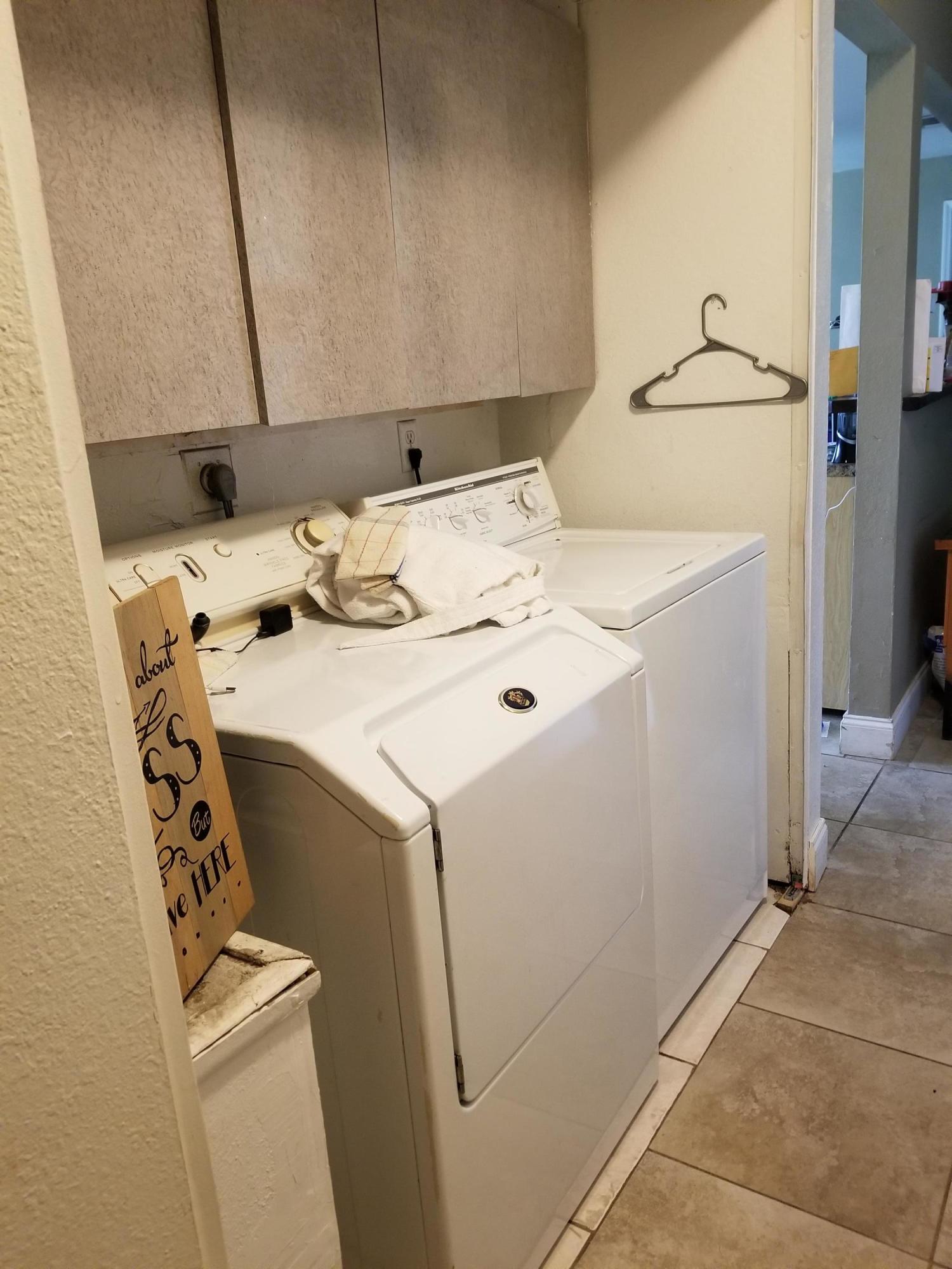 377 Southwest Cherryhill Road Port St. Lucie, FL 34953 - Photo 5 of 13 Laundry Closet