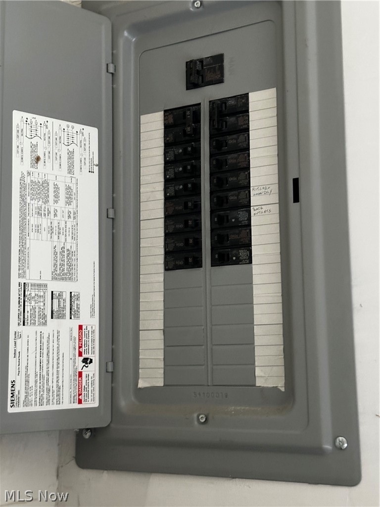 198 Park Road Painesville, OH 44077 - Photo 19 of 31 Main electrical panel featuring multiple circuit breakers