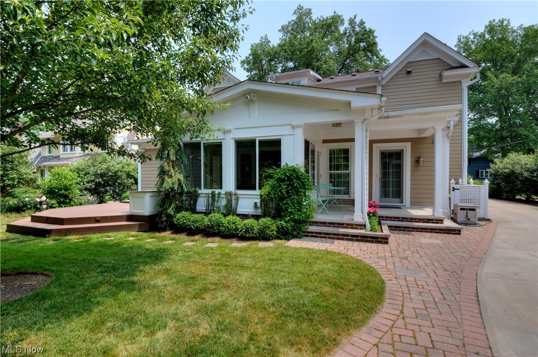 2878 Brighton Road Cleveland, OH 44120 - Photo 33 of 35 Enjoy views of the beautifully landscaped yard and gardens from the fabulous sandstone portico in front, covered terrace and large composite deck
in back