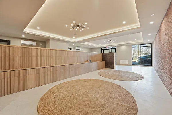 a view of a livingroom with a white furniture
