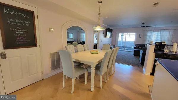 a view of a dining room with furniture
