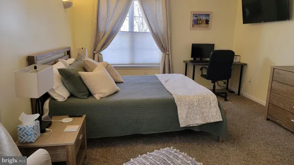 a bathroom with a double vanity sink and mirror