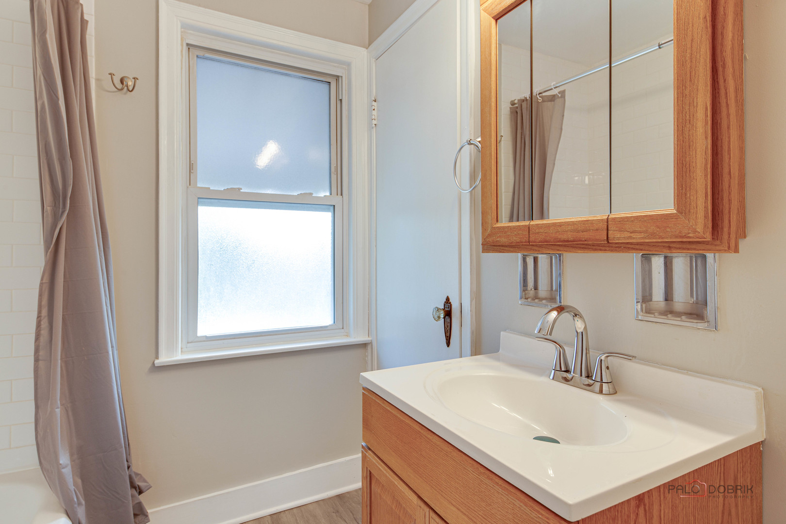 2320 South 22nd Avenue Broadview, IL 60155 - Photo 16 of 35 a bathroom with a sink vanity and a mirror