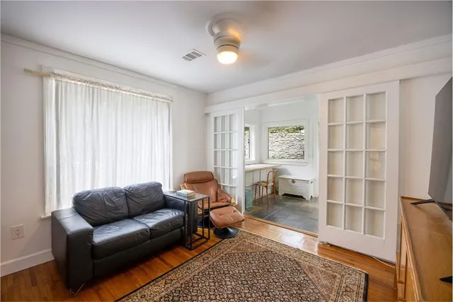 a living room with furniture and a window