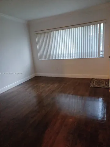 a view of room with hardwood