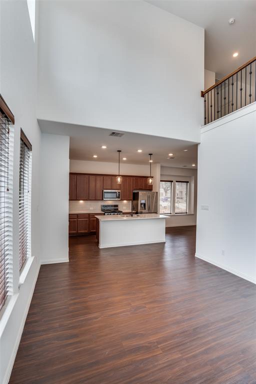 9815 Romo Street Irving, TX 75063 - Photo 9 of 25 a living room with furniture and a wooden floor