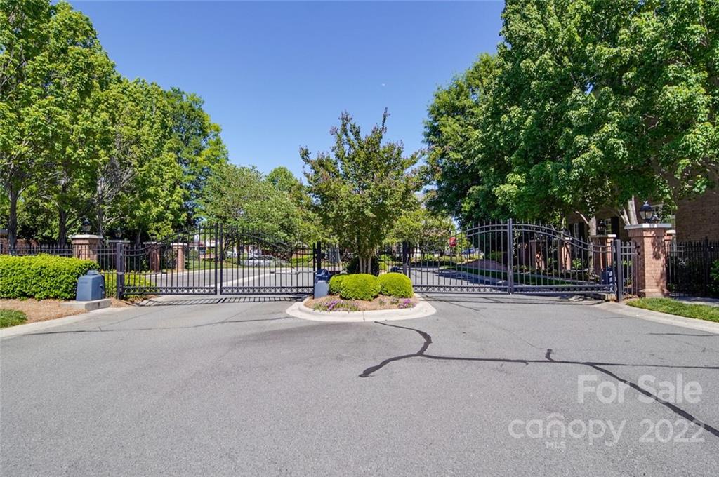 6309 Wakehurst Road Charlotte, NC 28226 - Photo 44 of 48 a view of street with tall buildings
