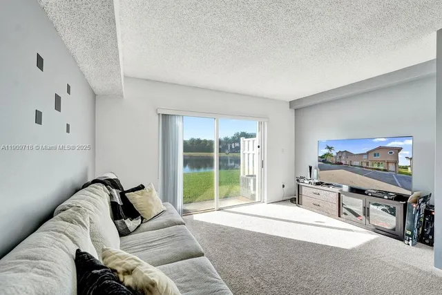a view of a livingroom with furniture and a livingroom