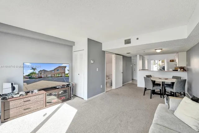 a en suite bathroom with a sink and a mirror