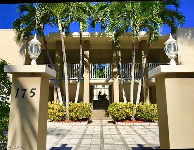 175 5th Avenue South, Unit 104 Naples, FL 34102 - Photo 3 of 9 a view of path along with potted plants