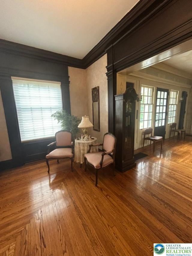 1170 Mosser Road Breinigsville, PA 18031 - Photo 16 of 19 Rich hardwood flooring extends throughout this inviting interior space with detailed crown molding.