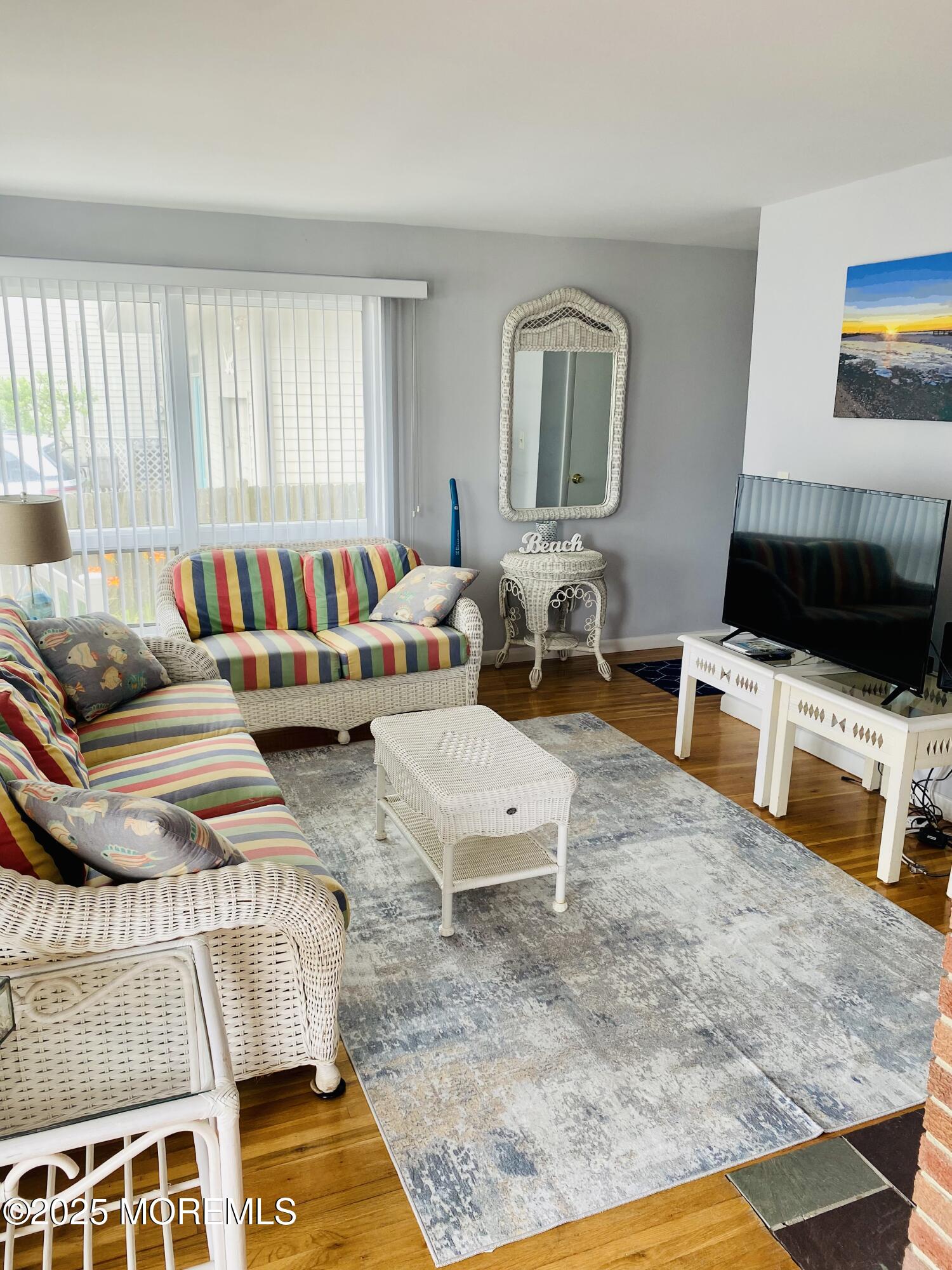 4 Camden Avenue, Unit DOWN Lavallette, NJ 08735 - Photo 3 of 14 a living room with furniture and a flat screen tv