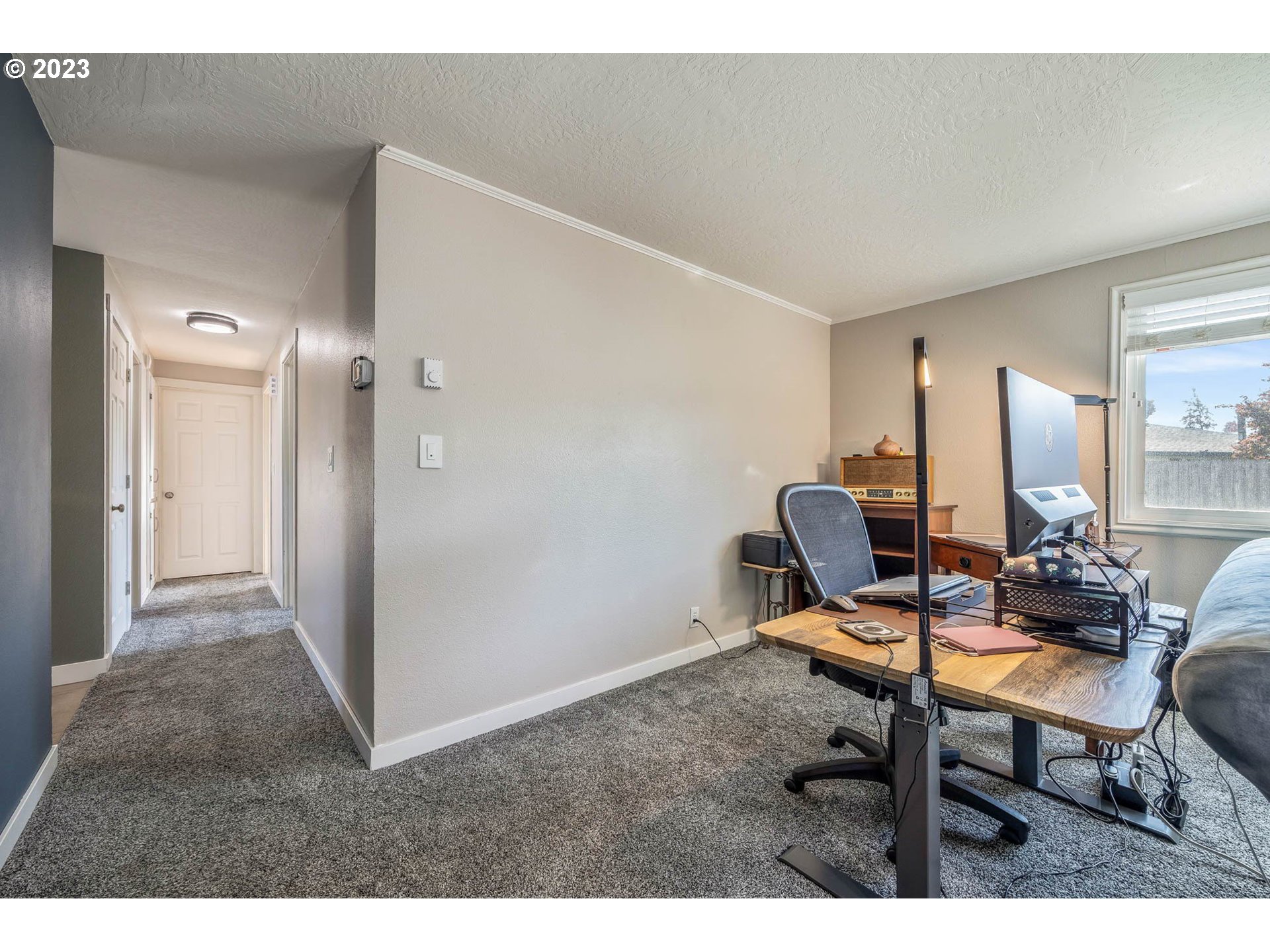 1083 Quinalt Street Springfield, OR 97477 - Photo 17 of 39 a workspace with furniture and a bathroom