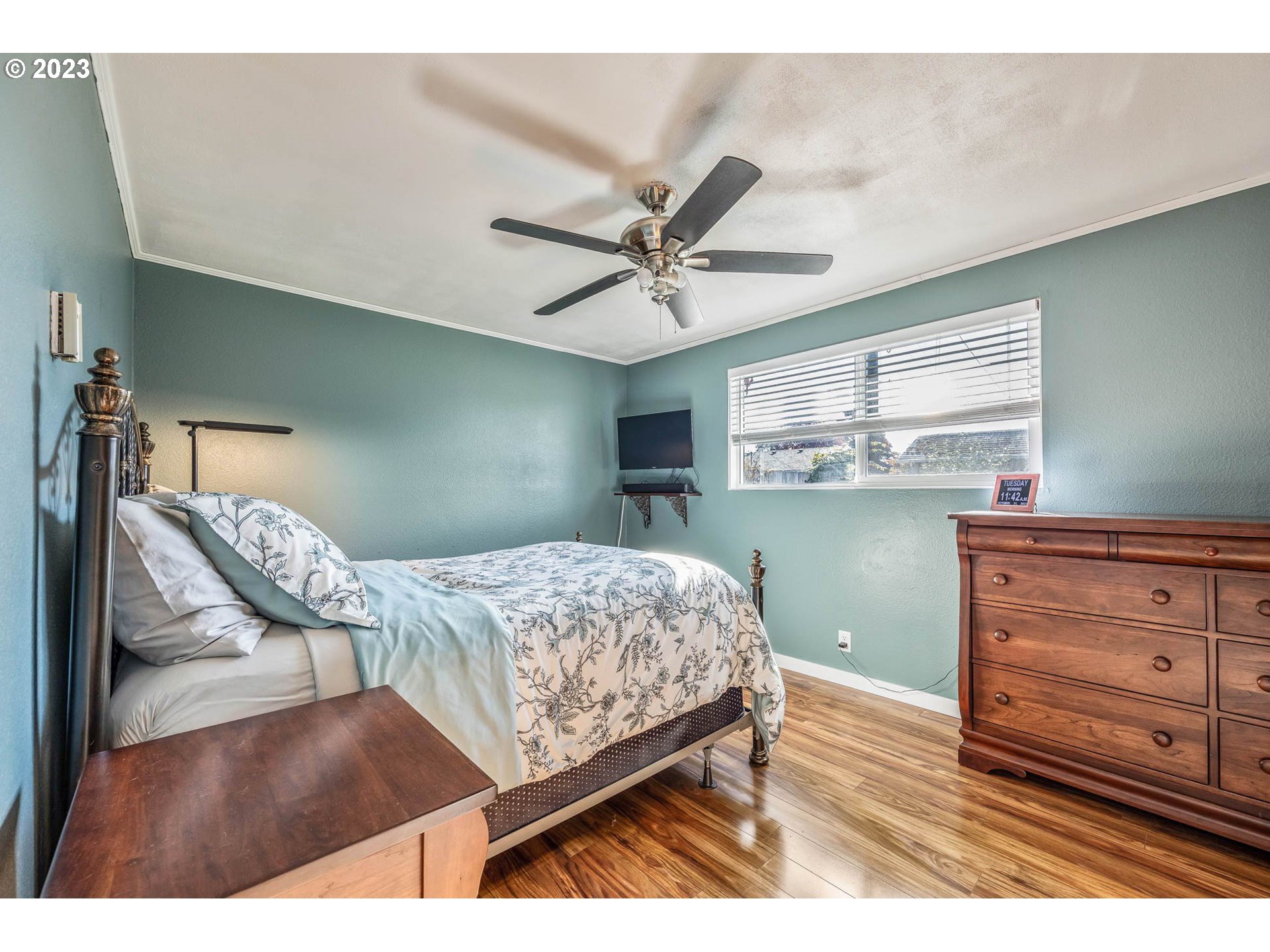 1083 Quinalt Street Springfield, OR 97477 - Photo 19 of 39 a bedroom with a bed and window