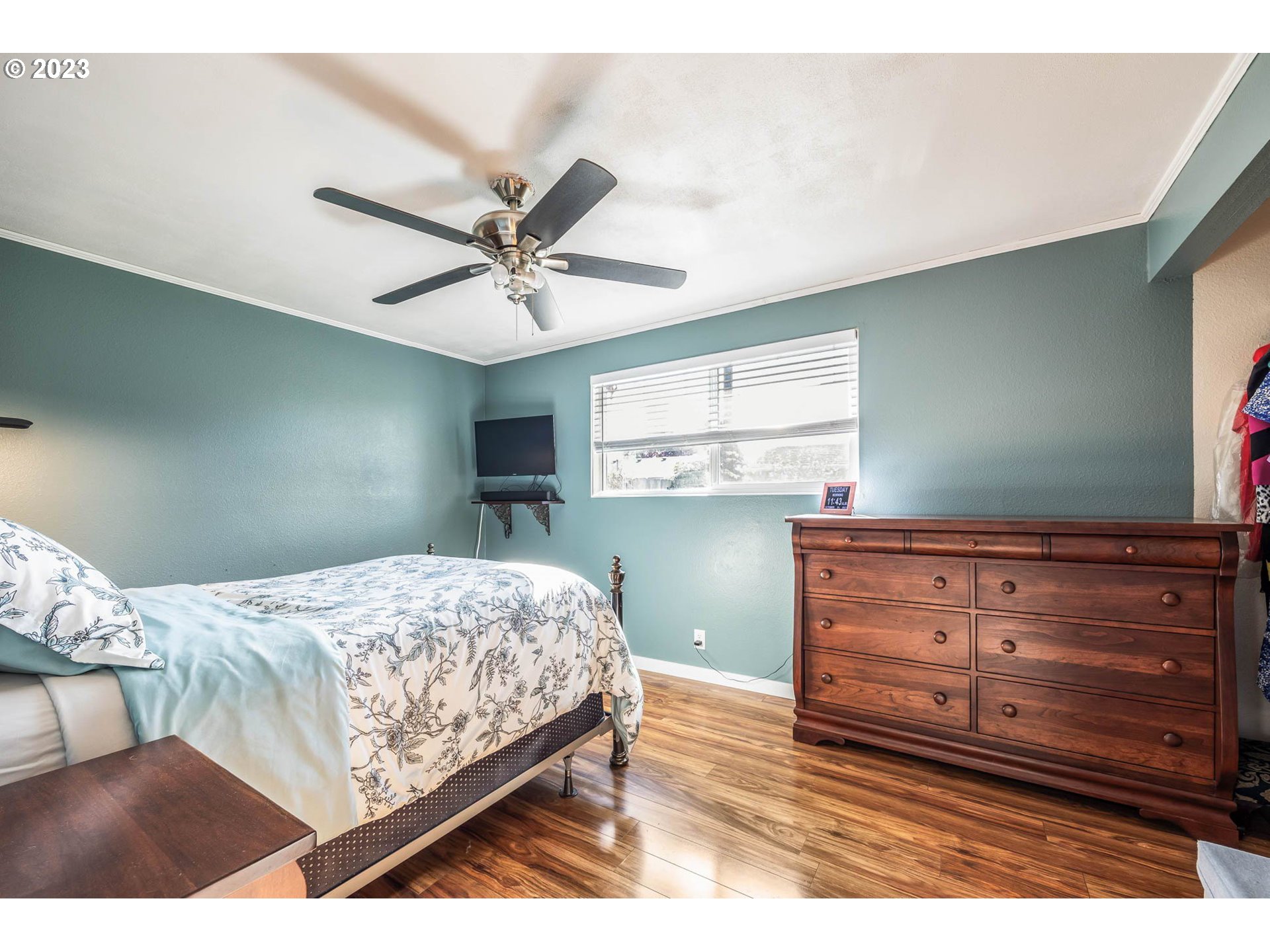 1083 Quinalt Street Springfield, OR 97477 - Photo 20 of 39 a bedroom with a bed window and a ceiling fan