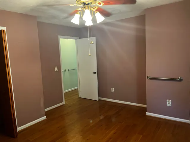 a bathroom with a sink vanity and mirror