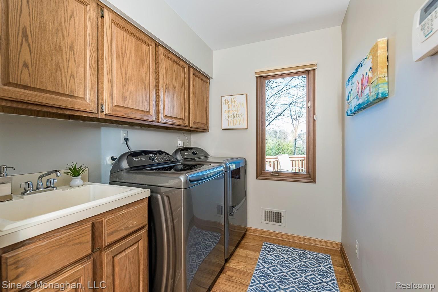 4906 Rivers Edge Drive Troy, MI 48098 - Photo 29 of 60 Main floor laundry/mudroom