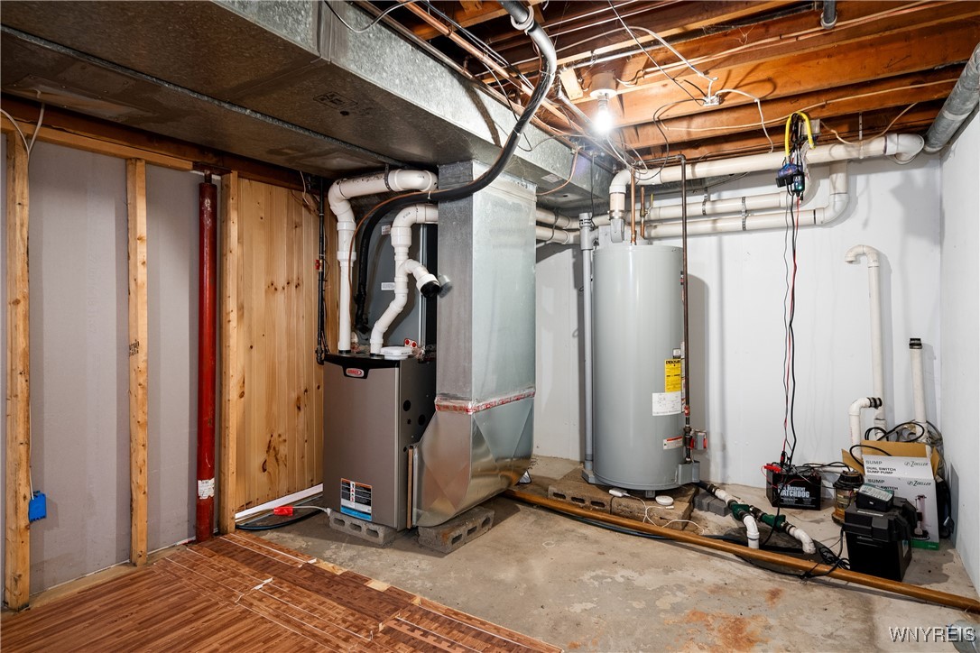 11541 Hunts Corners Road Newstead, NY 14001 - Photo 30 of 50 Lennox furnace, hot water tank, and sump pumps