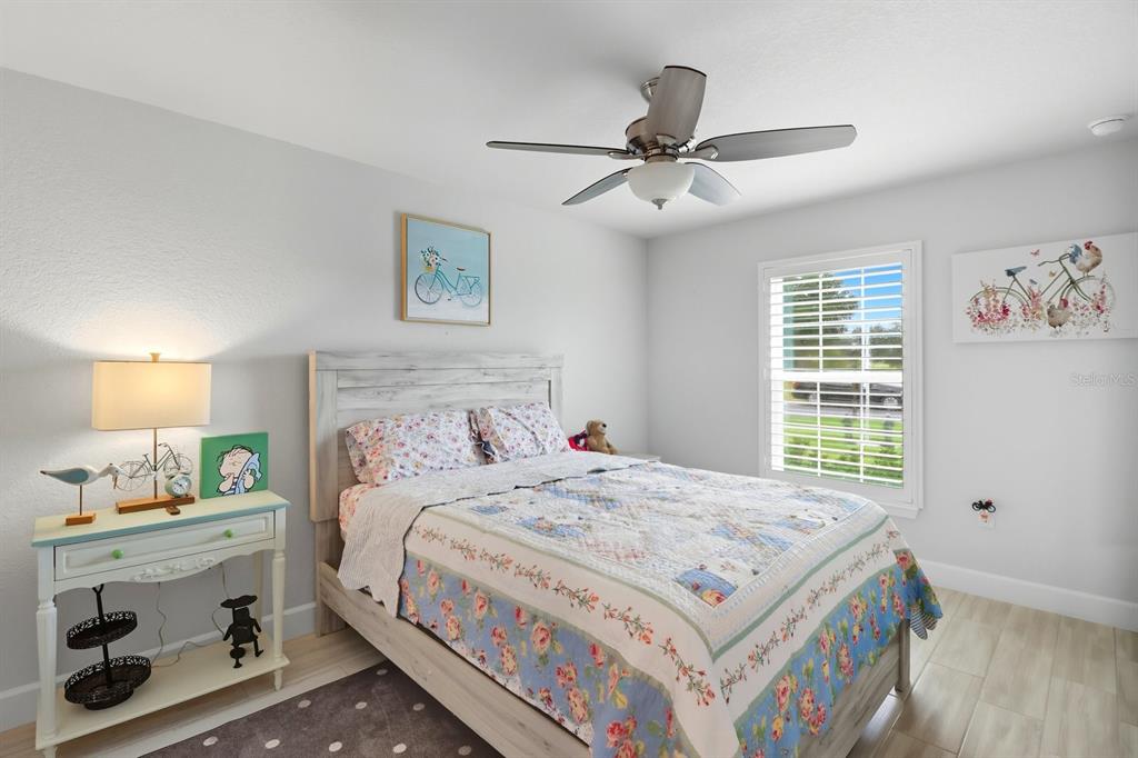 6788 Southwest 179th Ave Road Dunnellon, FL 34432 - Photo 15 of 23 a bedroom with a bed and a window