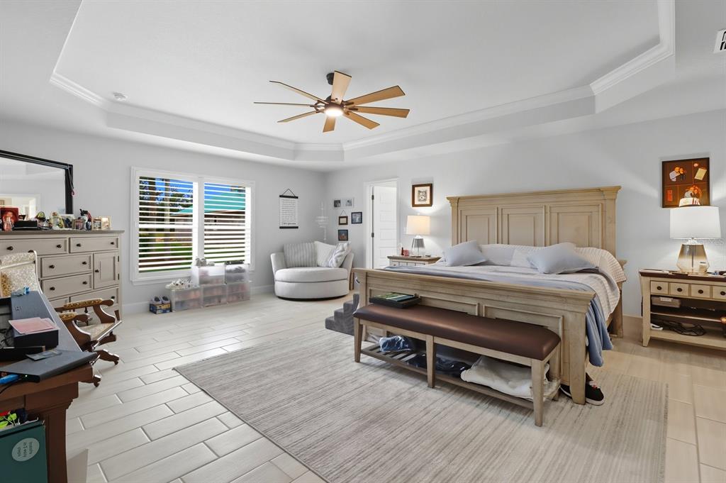 6788 Southwest 179th Ave Road Dunnellon, FL 34432 - Photo 19 of 23 a bedroom with furniture and a window