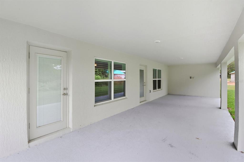 6788 Southwest 179th Ave Road Dunnellon, FL 34432 - Photo 21 of 23 an empty room with windows