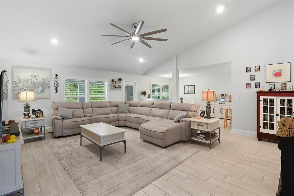 6788 Southwest 179th Ave Road Dunnellon, FL 34432 - Photo 8 of 23 a living room with furniture and a large window