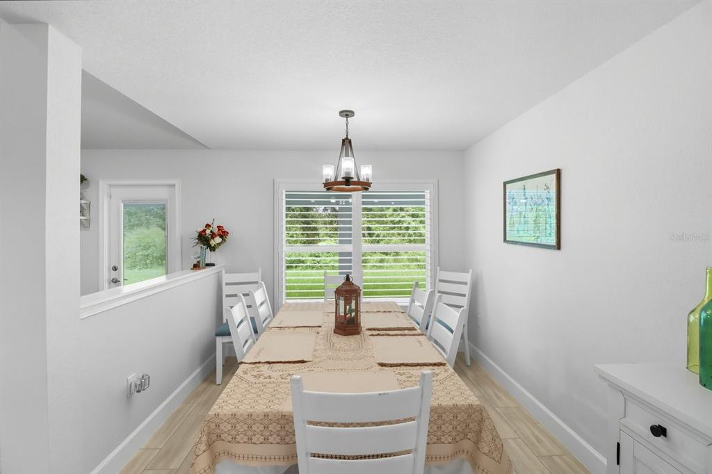 6788 Southwest 179th Ave Road Dunnellon, FL 34432 - Photo 9 of 23 a living room with furniture and a window