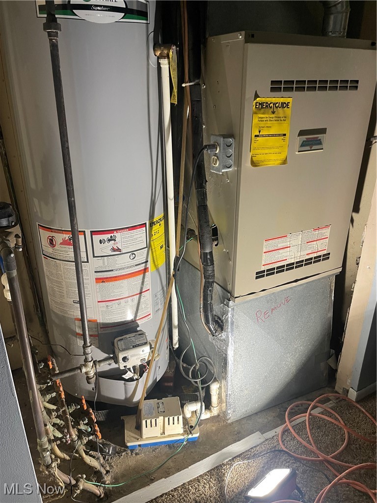 5741 Jaycox Road North Ridgeville, OH 44039 - Photo 15 of 23 Utilities with gas water heater and heating unit