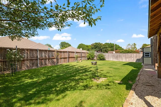 a view of a house with a yard porch and sitting area