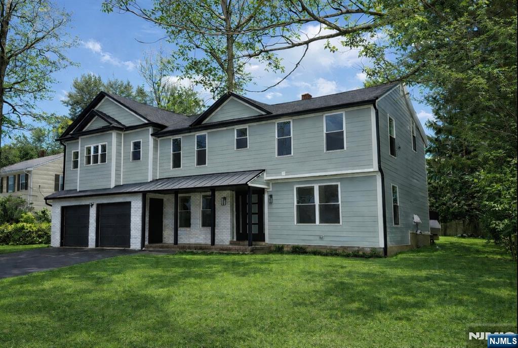 a view of a house with a garden